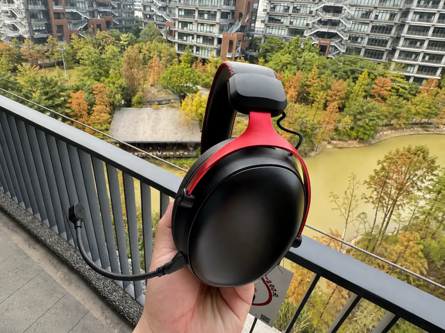 G938 China OEM gaming headset case study red black earcup angle view