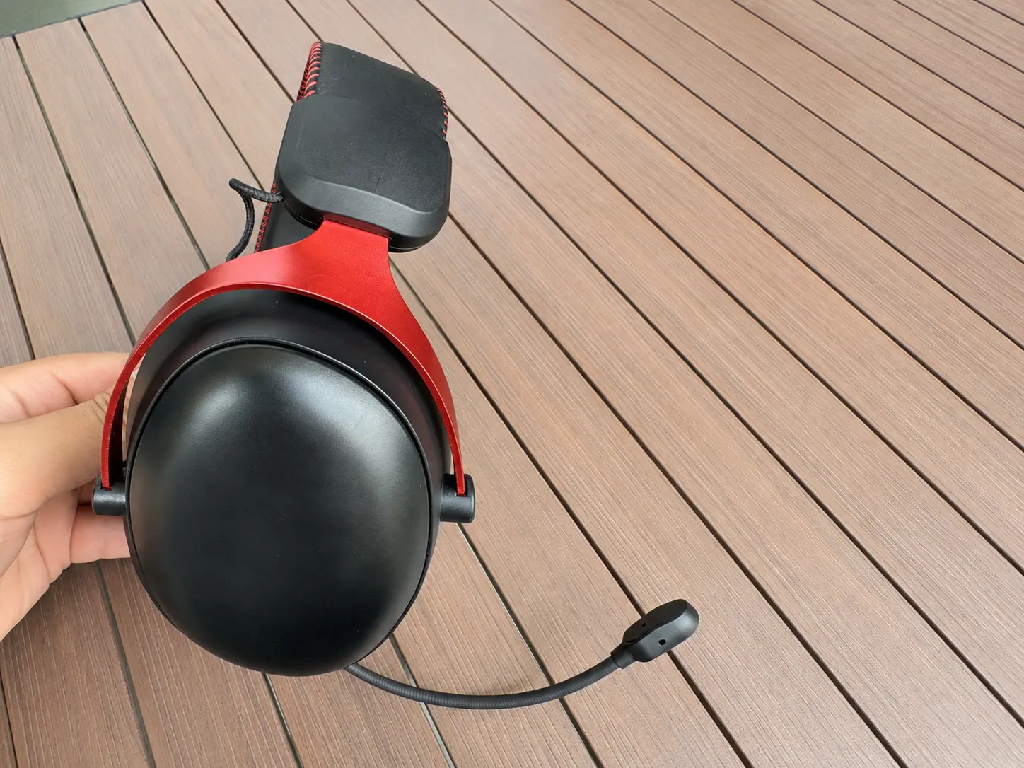G938 China OEM gaming headset case study red headband boom microphone view