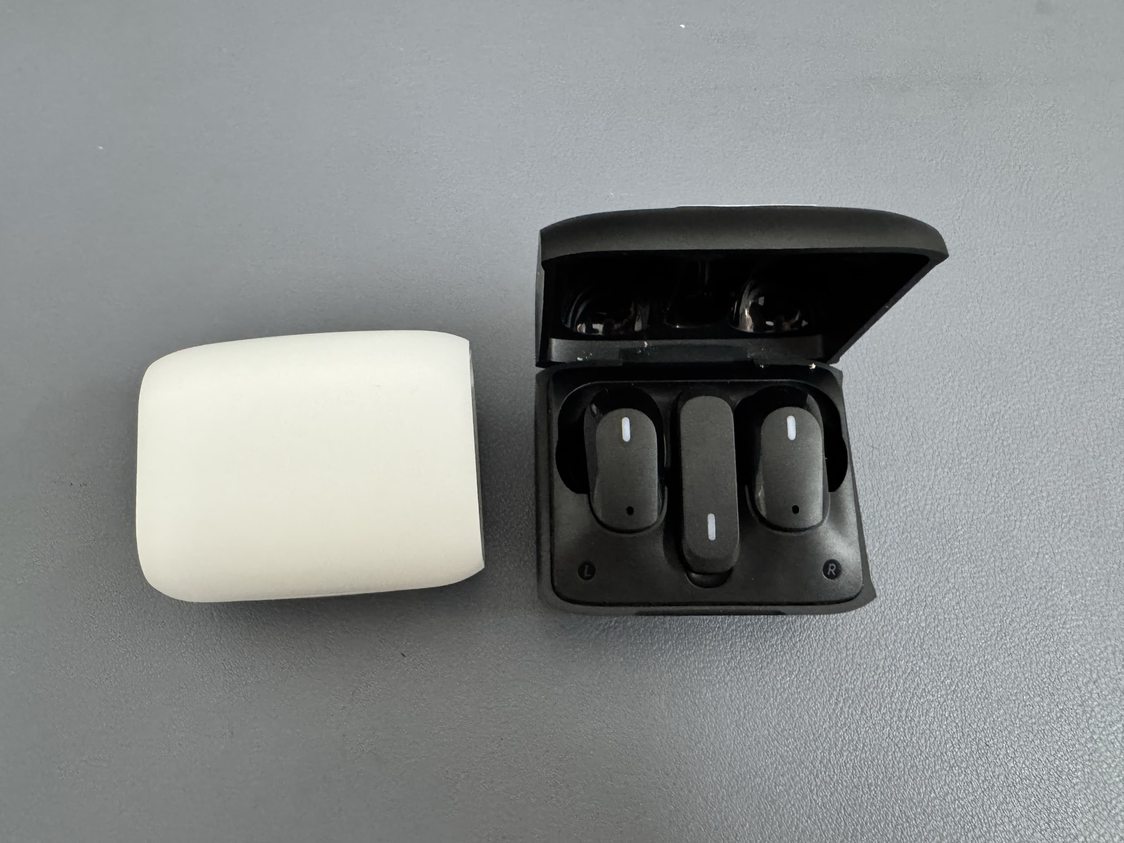 GE5 Korea OEM gaming TWS earbuds case study black and white charging case sample view