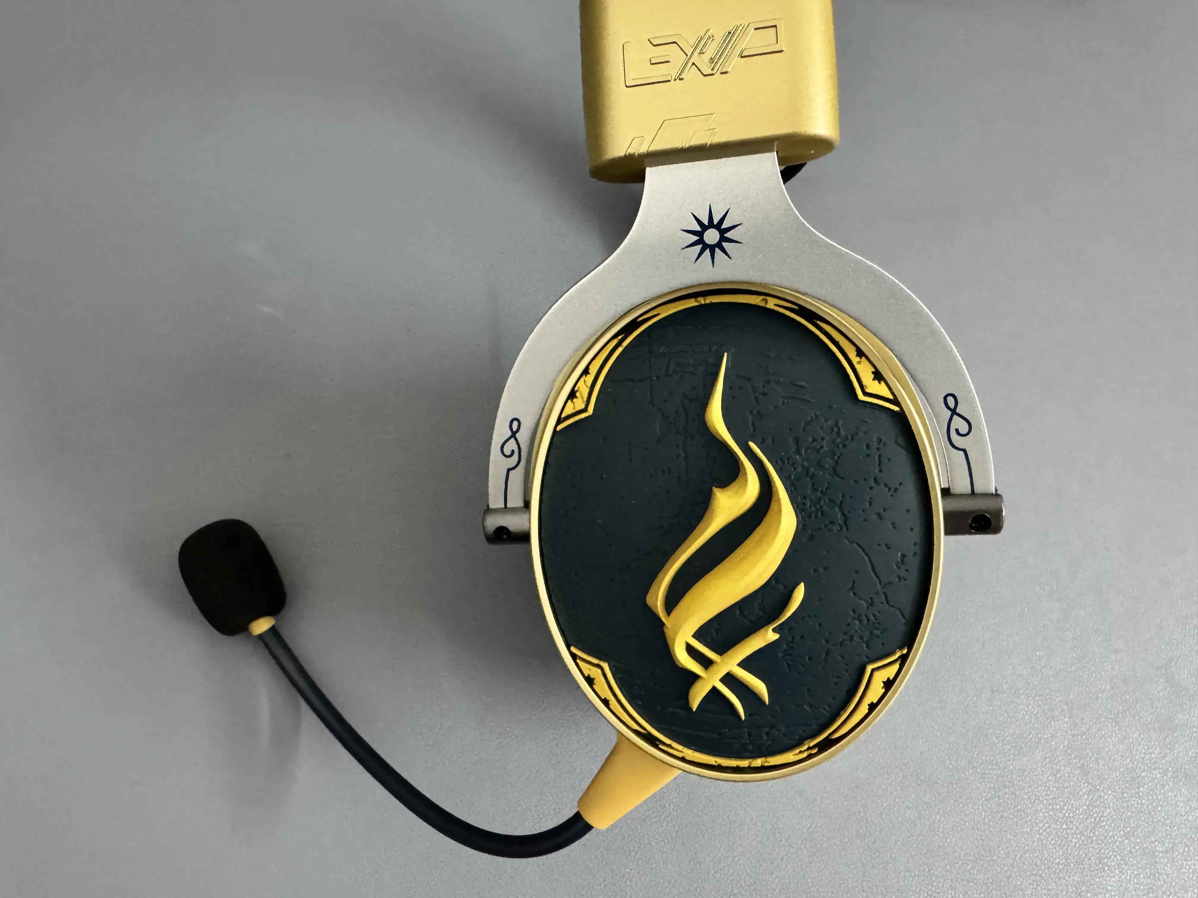 HOG gaming headset gold logo and metallic earcup CMF detail